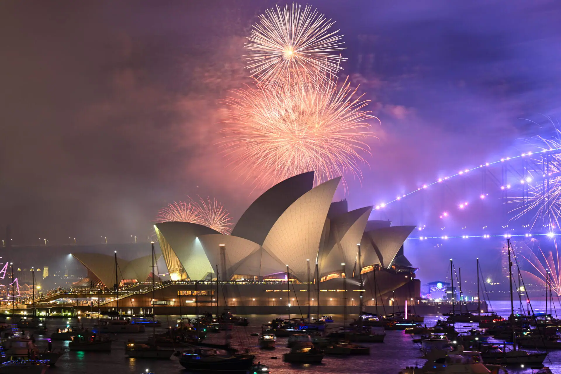 fill the sky over the Opera House in Sydney on New Year's Eve on December 31, 2024 in Sydney, Australia. Revellers turned out in large numbers to celebrate the new year in Australia. (Photo by Izhar Khan/Getty Images)