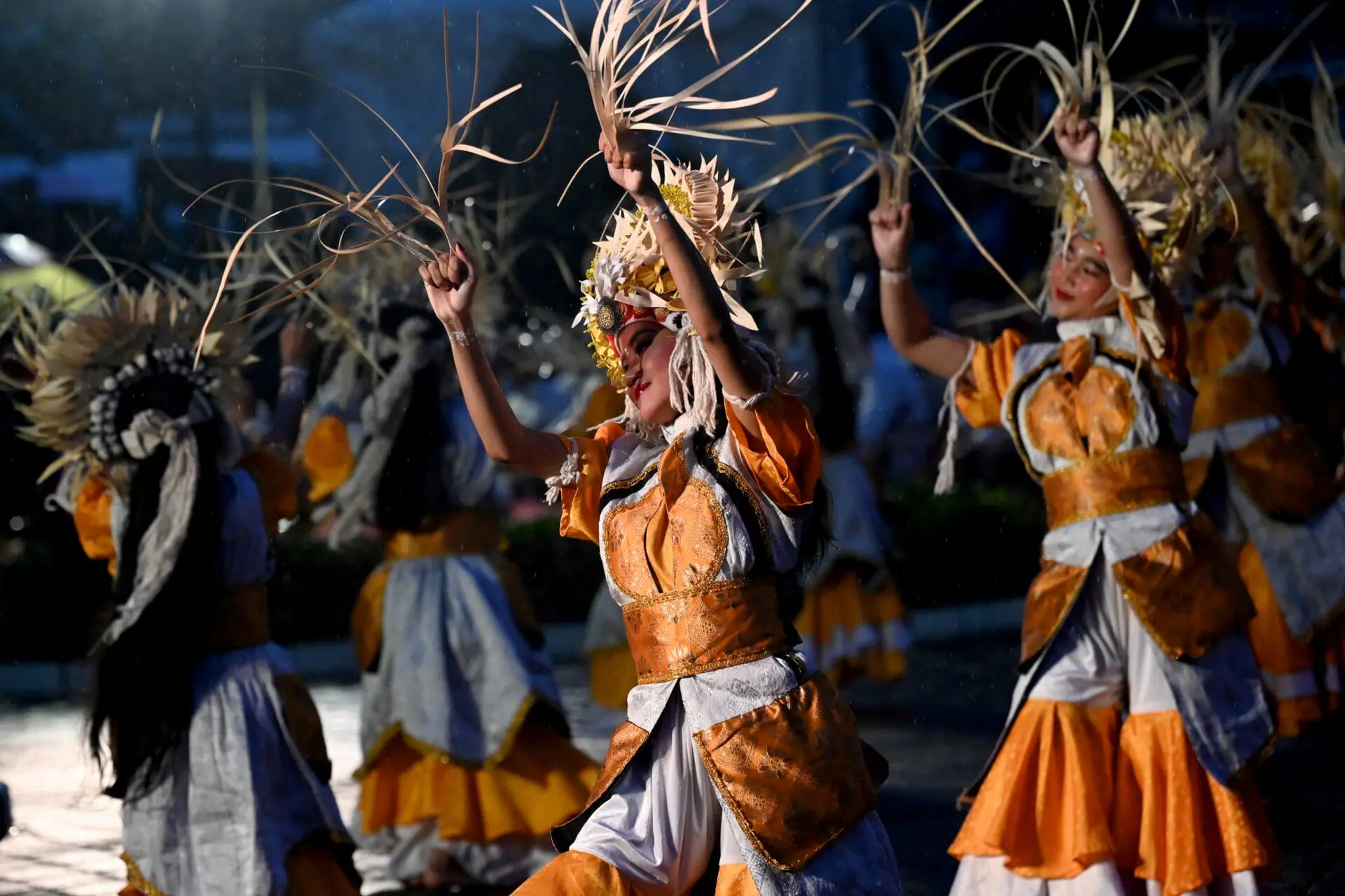 Balinese traditional dancers perform during the dance of releasing the sun 2024, welcoming the sun 2025 a New Year's Eve celebration in Denpasar on Indonesia's resort island of Bali on December 31, 2024. (Photo by SONNY TUMBELAKA / AFP) (Photo by SONNY TUMBELAKA/AFP via Getty Images)