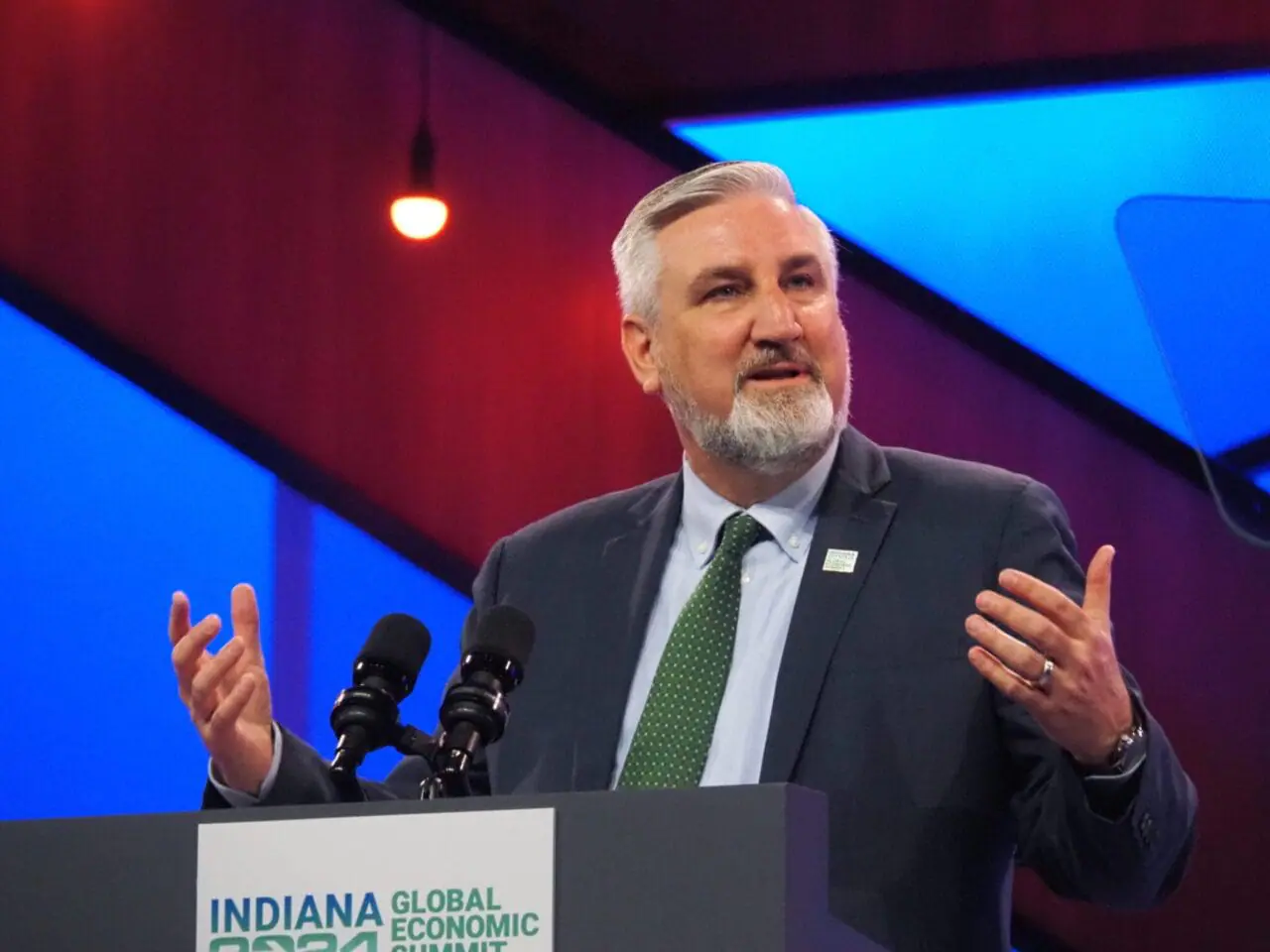 Gov. Eric Holcomb speaks at the Indiana Global Economic Summit in downtown Indianapolis on Thursday, May 23, 2024. (Leslie Bonilla Muñiz/Indiana Capital Chronicle)